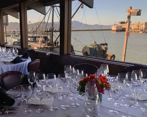 Glasses on Table with bay in the background