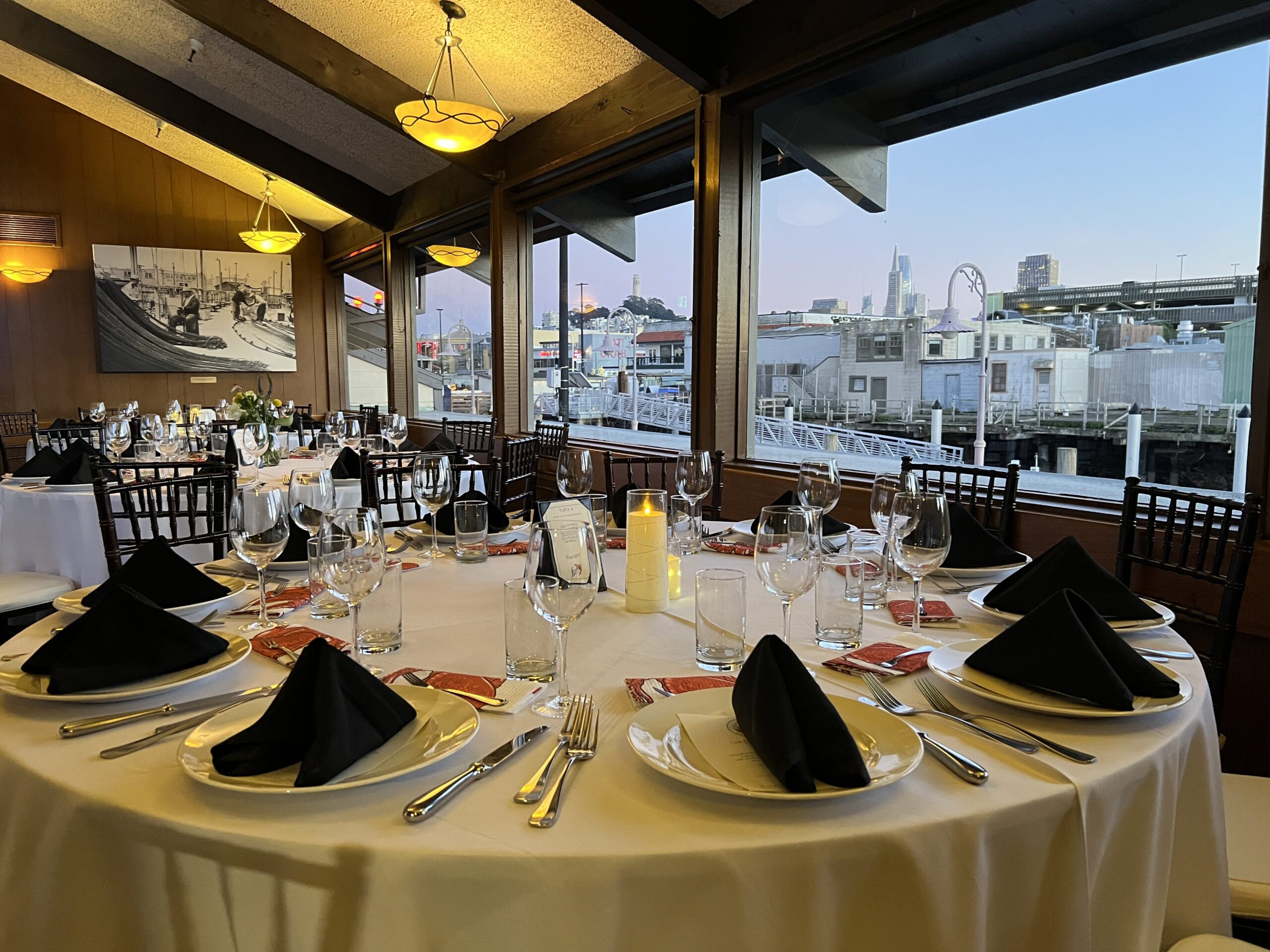 Round tables set for a private event at Scoma's